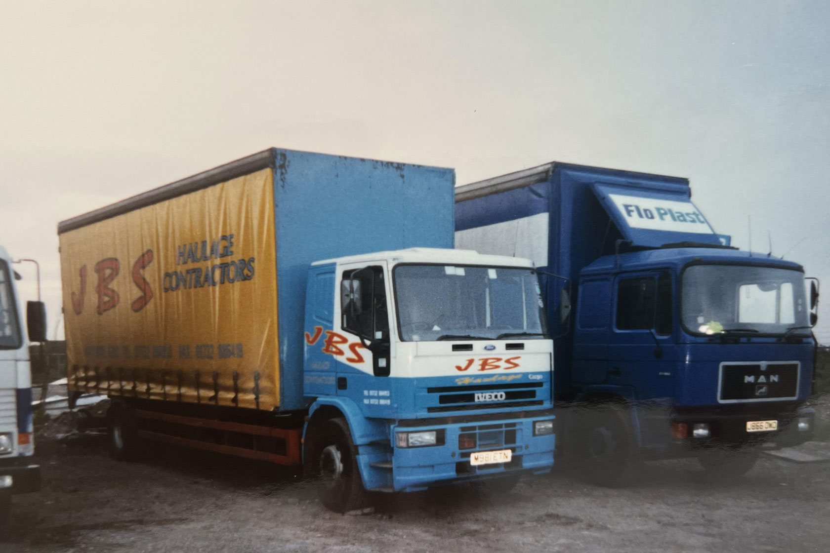 a old image of the newest truck at the time in the form of a Renault Magnum with a side and front view next to one of our other trucks making this the 10th